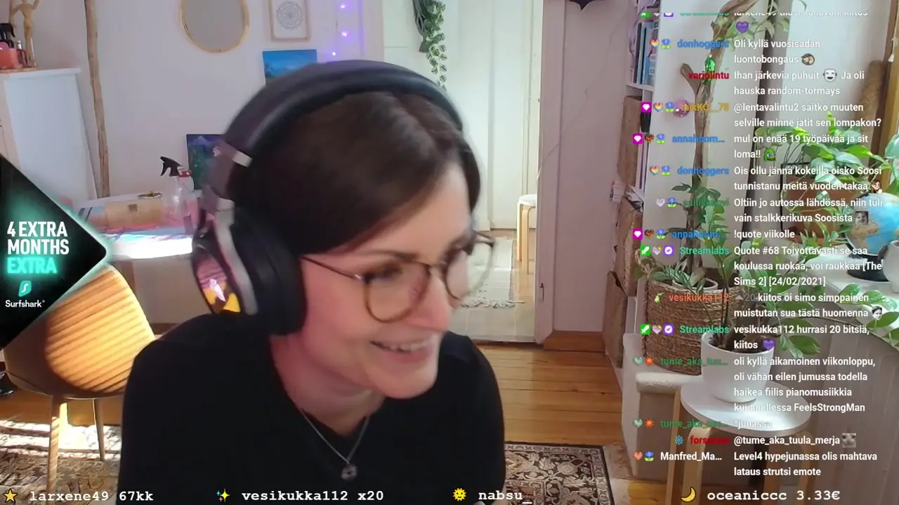 A frame from a recorded verification clip: a Finnish streamer live on Twitch with the Surfshark overlay in the corner.